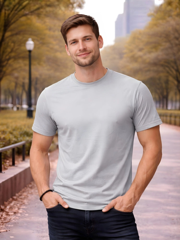 Man wearing a plain gray t-shirt in an urban park setting

Grey men’s classic crew neck T-shirt casual everyday wear by Stylewar