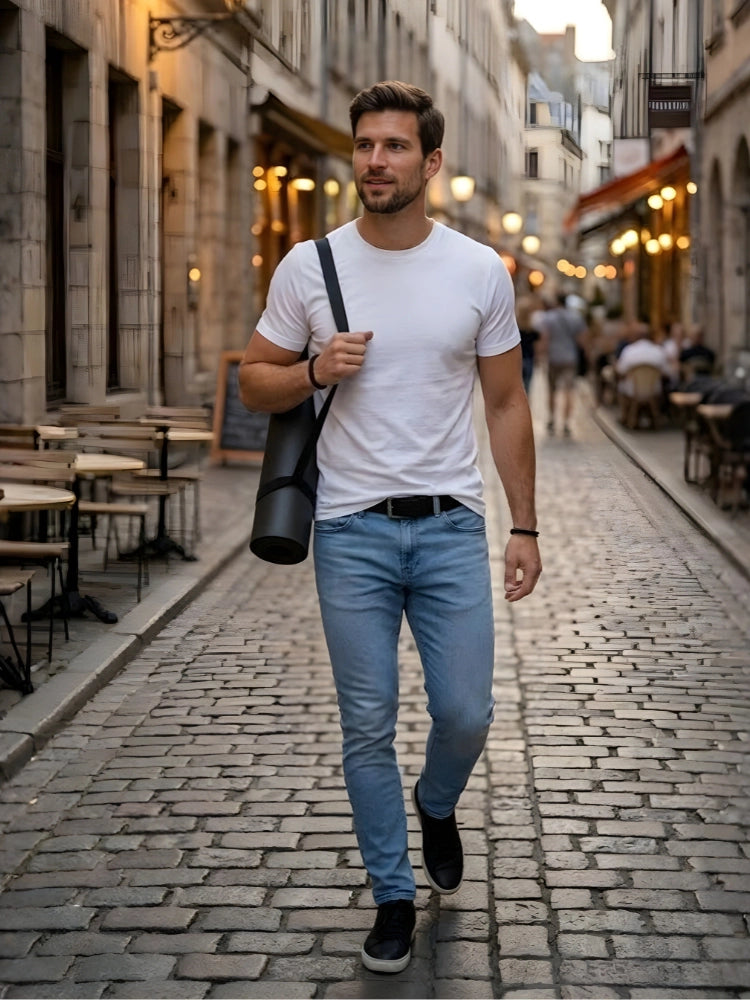 Man walking down a cobbled street in an urban setting.

Active Star Men White Crew Neck T-Shirt for casual wear