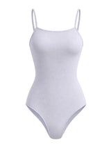White bodysuit with thin straps on a white background. Ladies Camisole for Ballet, Dancewear & Gym