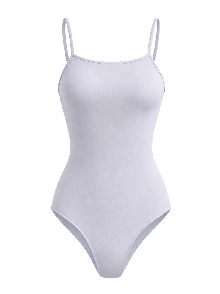 White bodysuit with thin straps on a white background. Ladies Camisole for Ballet, Dancewear & Gym