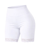 White shorts with lace trim on a white background. Ladies White Microfibre Lace Cycling Shorts for Sports & Gym